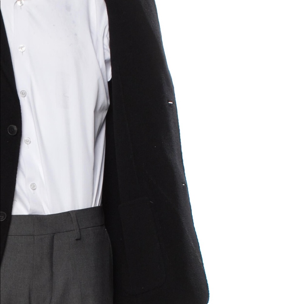Theory Wool Jacket
Black
Satin Lining
CollarPatch Pockets & Button Closure